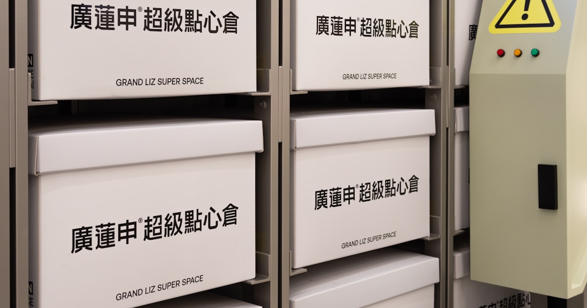 Rows of similar boxes arranged on retail shelving