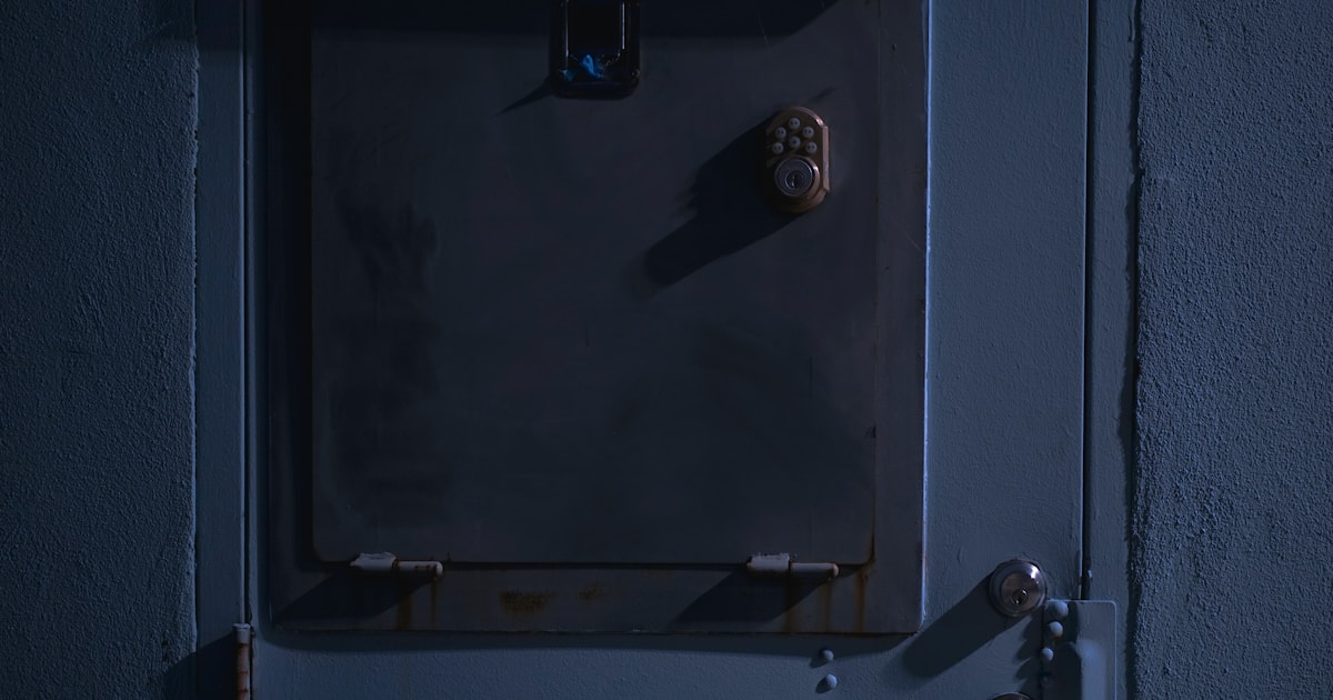Closed metal security door with a combination lock
